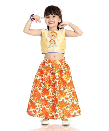 Heavy embroidered crop top choli with flair skirt .
