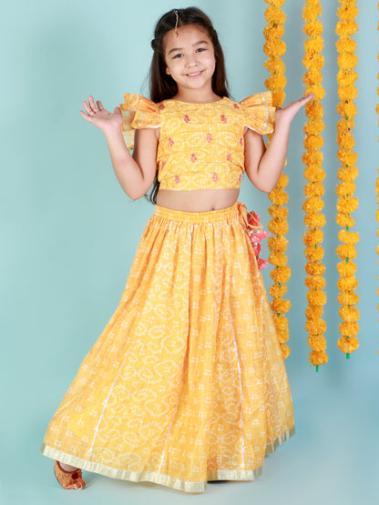 Mehfil yellow bandhni lehenga choli set with puffed sleeves