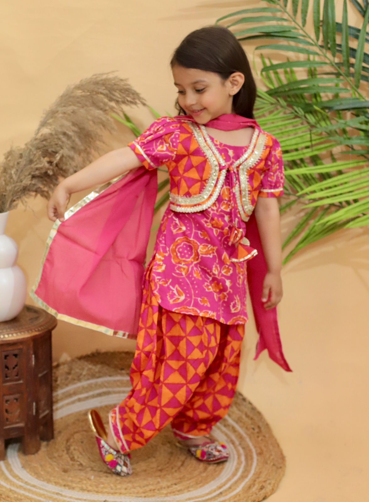 Nyra pink and orange patiyala shalwar and kurti with attached jacket