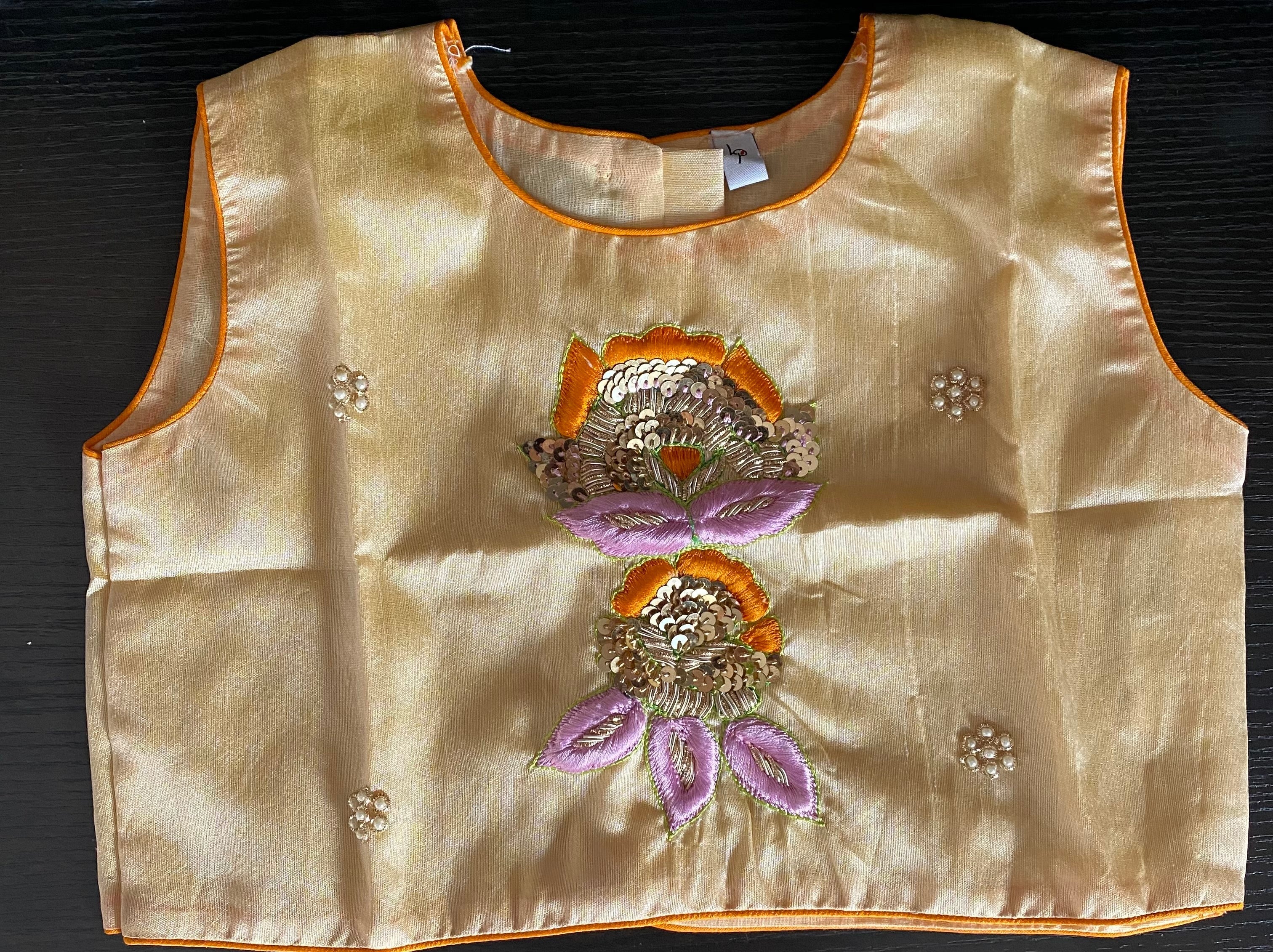 Heavy embroidered crop top choli with flair skirt .
